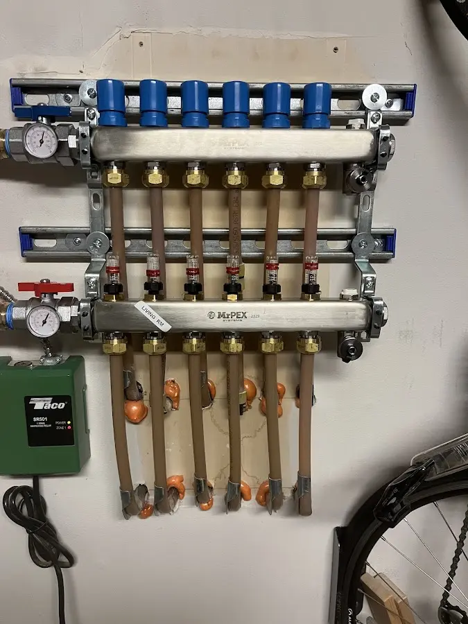 Plumber performing Leak Detection at a residential property in Wilton Manors